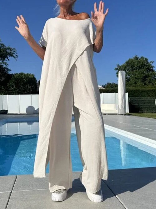 Vienspalvis pečius atidengiantis palaidinės ir kelnių komplektas